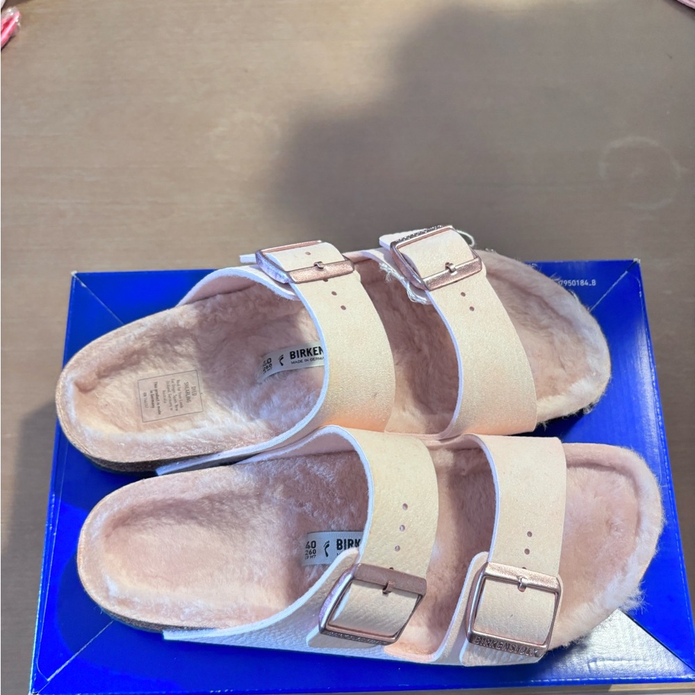 Birkenstock Pink Sandals with Adjustable Straps and Contoured Footbed